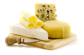 Variety of cheeses on a cheese board