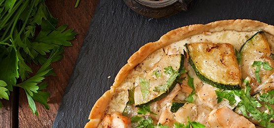 Quiche with chicken and zucchini with herbs